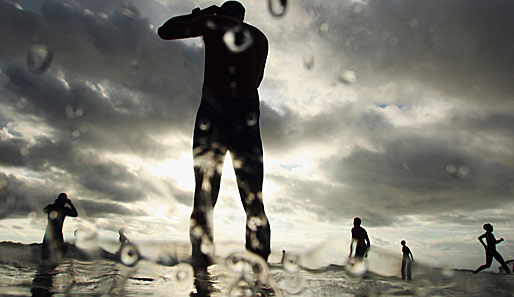 Hier ging der Fotograf da hin, wo's nass ist. Es hat sich gelohnt: Dramatischer kann man den Contact Tri-Triathlon in Neuseeland kaum in Szene setzen