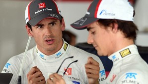 Adrian Sutil (l.) bekundet sein Mitgefühl für den verletzten Jules Bianchi