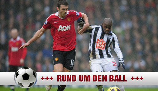 Nationalspieler Michael Carrick (l.) bleibt bis 2014 bei den Red Devils