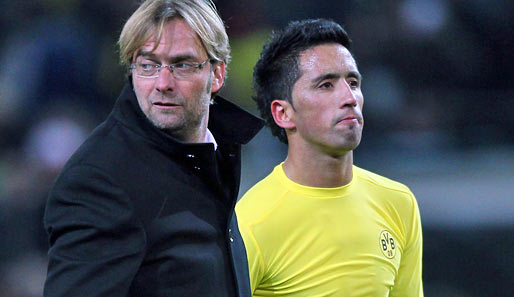 BVB-Trainer Jürgen Klopp (l.) sieht eher schwarz für Lucas Barrios' Einsatz gegen Leverkusen