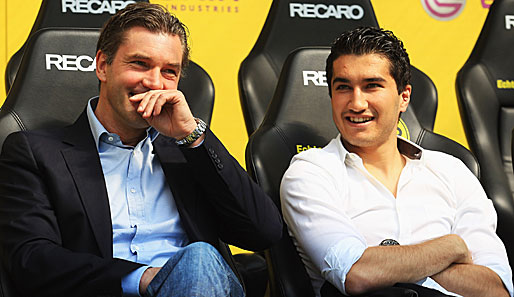 Sportdirektor Michael Zorc (l.) will Nuri Sahin bei Borussia Dortmund halten