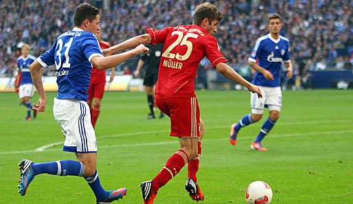 Julian Draxler (l.) zieht gegen Thomas Müller den Kürzeren