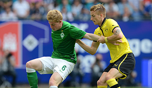 Spielt Kevin de Bruyne (l.) in der kommenden Saison im gleichen Team wie Marco Reus (r.) ?