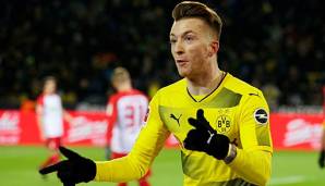 Marco Reus feiert seine 100. Torbeteiligung in der Bundesliga.