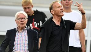 Reinhard Rauball (l.) hält an den großen Zielen von Borussia Dortmund fest.