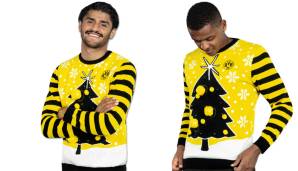 Der BVB darf in Sachen Ugly Christmas Sweater natürlich nicht fehlen. Mo Dahoud hat sich längst an die Schmuckstücke gewöhnt. Manuel Akanji wirkt hingegen noch mehr als skeptisch.