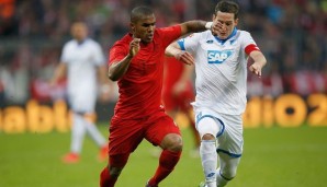 Hier noch Gegner, bald Mitspieler: Douglas Costa vom FC Bayern und Sebastian Rudy