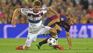 Typisch unkonventionell: Thomas Müller im Zweikampf mit Javier Mascherano