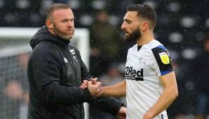 Wayne Rooney mit seinem defensiven Mittelfeldspieler Graeme Shinnie.