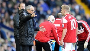 Felix Magath (l.) und Lewis Holtby (r.) wollen Fulham vor dem Abstieg bewahren