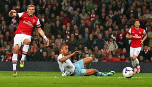 Lukas Podolski (l.) schnürte einen Doppelpack gegen West Ham United