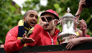 Jack Wilshere (r.) spielt bereits seit der Jugend für Arsenal