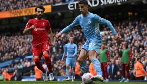 Rasantes, ultra-intensives Spitzenspiel: Joao Cancelo verteidigt den Ball vor Liverpools Mo Salah.