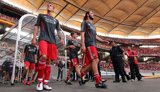 Für Daniel Agger (l.) und Andy Carroll könnte die Zeit in Liverpool bald beendet sein