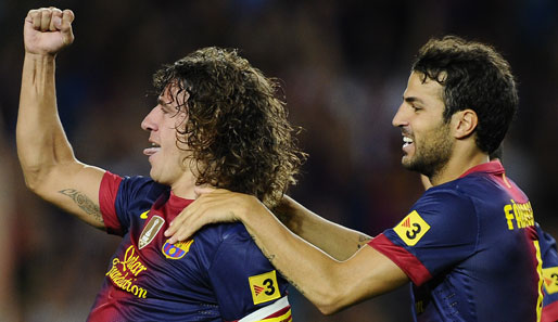 Barcelonas Kapitän Puyol (l.) verletzte sich beim 2:1-Sieg gegen CA Osasuna