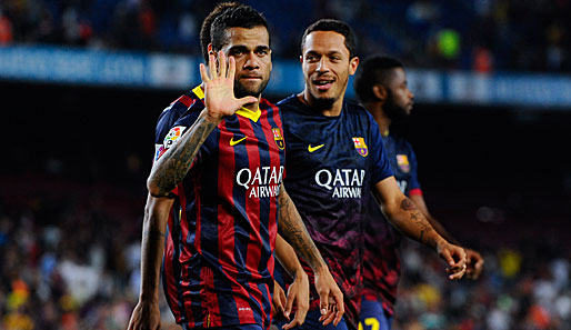 Dani Alves (l.) spielt bereits seit sechs Jahren für den FC Barcelona