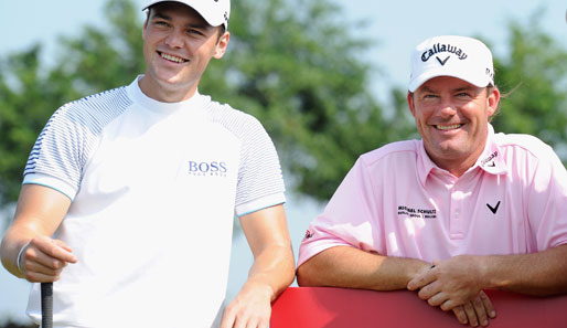 Martin Kaymer (l.) und Alex Cejka haben in China einen guten Start hingelegt