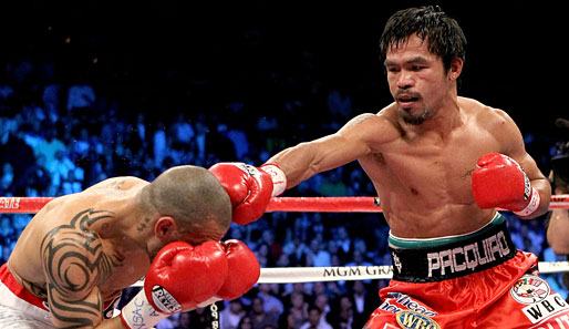 Manny Pacquiao (r.) besiegte im Miguel Cotto in Las Vegas