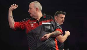 Phil Taylor steht in der dritten Runde