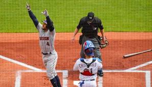 Springer (li.) schlug gleich beim dritten Pitch der Saison einen Homerun.