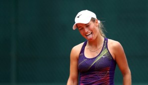 PARIS, FRANCE - MAY 26: Yulia Putintseva of Kazakhstan reacts during the Ladies Singles second round match against Andrea Petkovic of Germany on day five of the 2016 French Open at Roland Garros on May 26, 2016 in Paris, France. (Photo by Julian Fi...